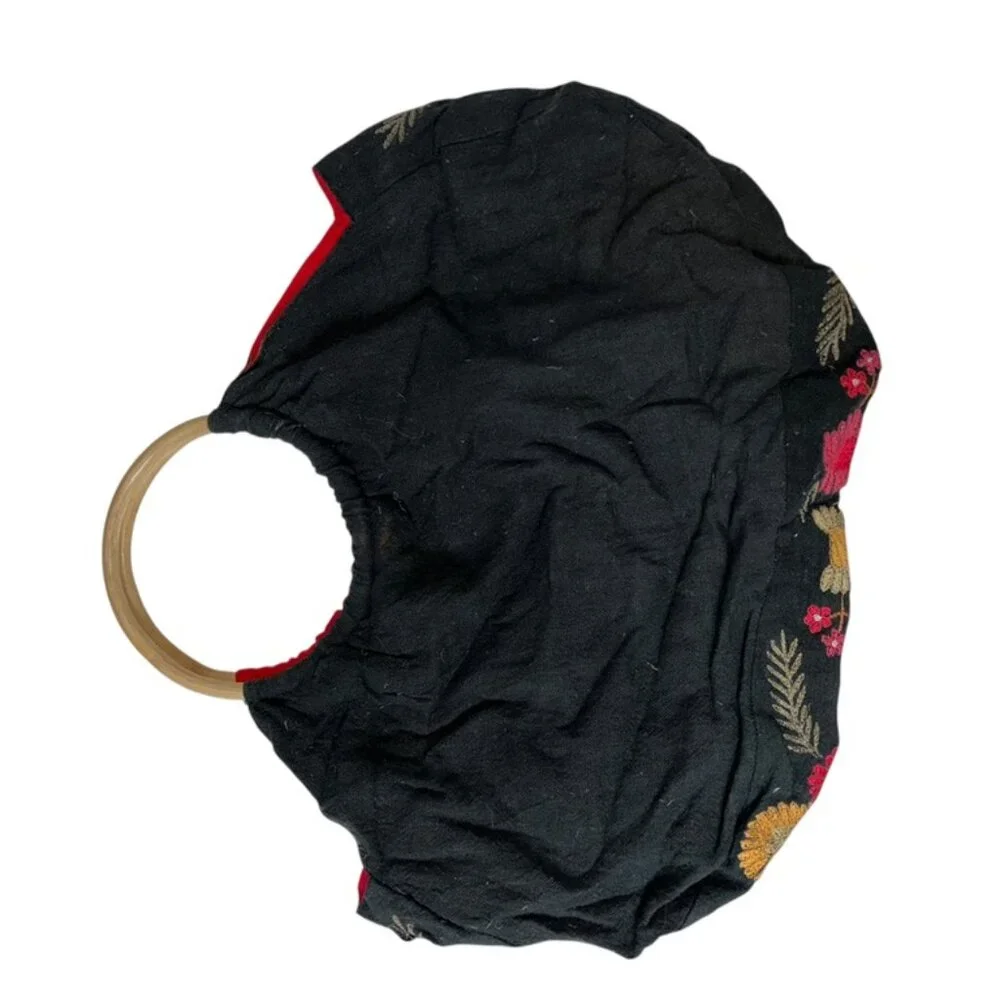 Christian Livingston black embroidered floral bag